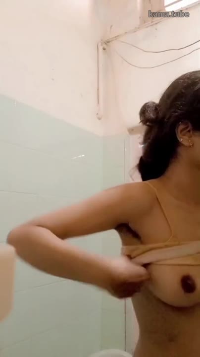 Beautiful desi girl strips and takes shower